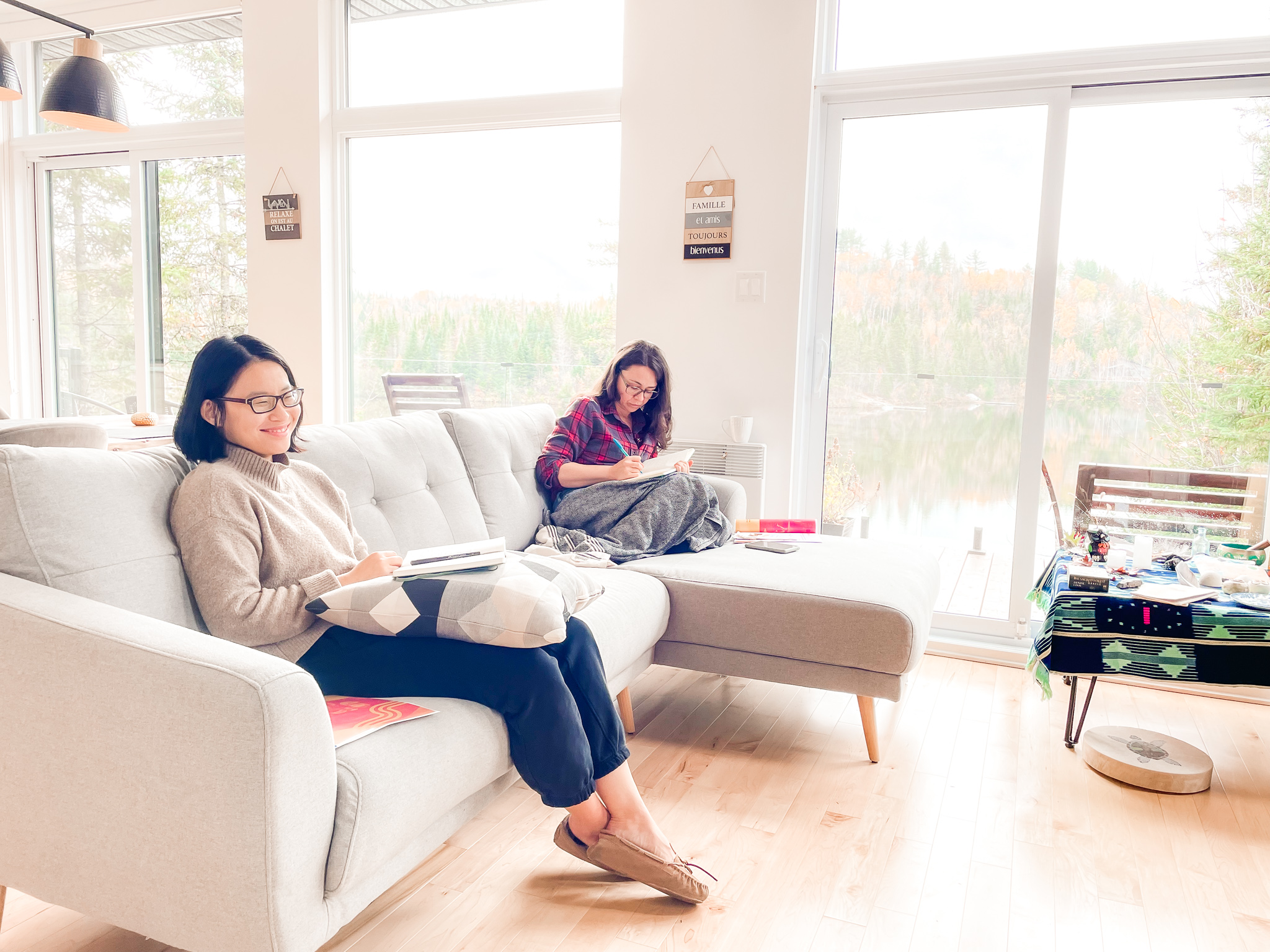 Women journaling during a conscious leadership retreat