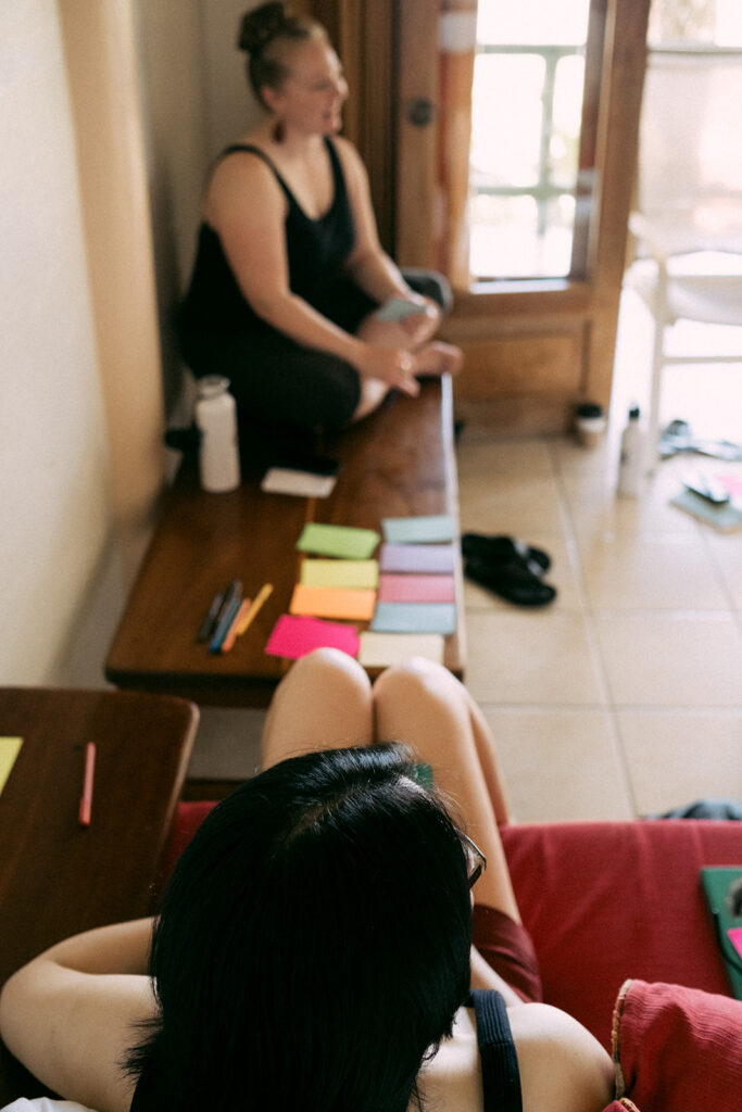 Women in a workshop with colourful index cards